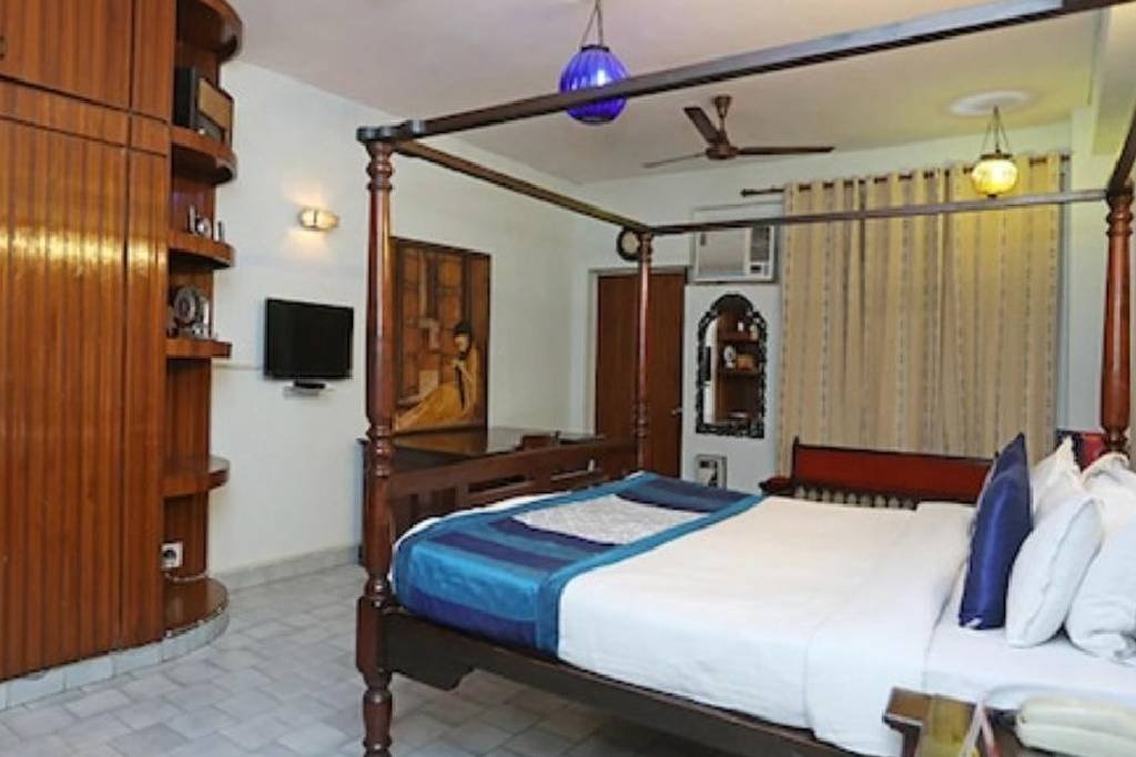Heritage bedroom with wooden bed