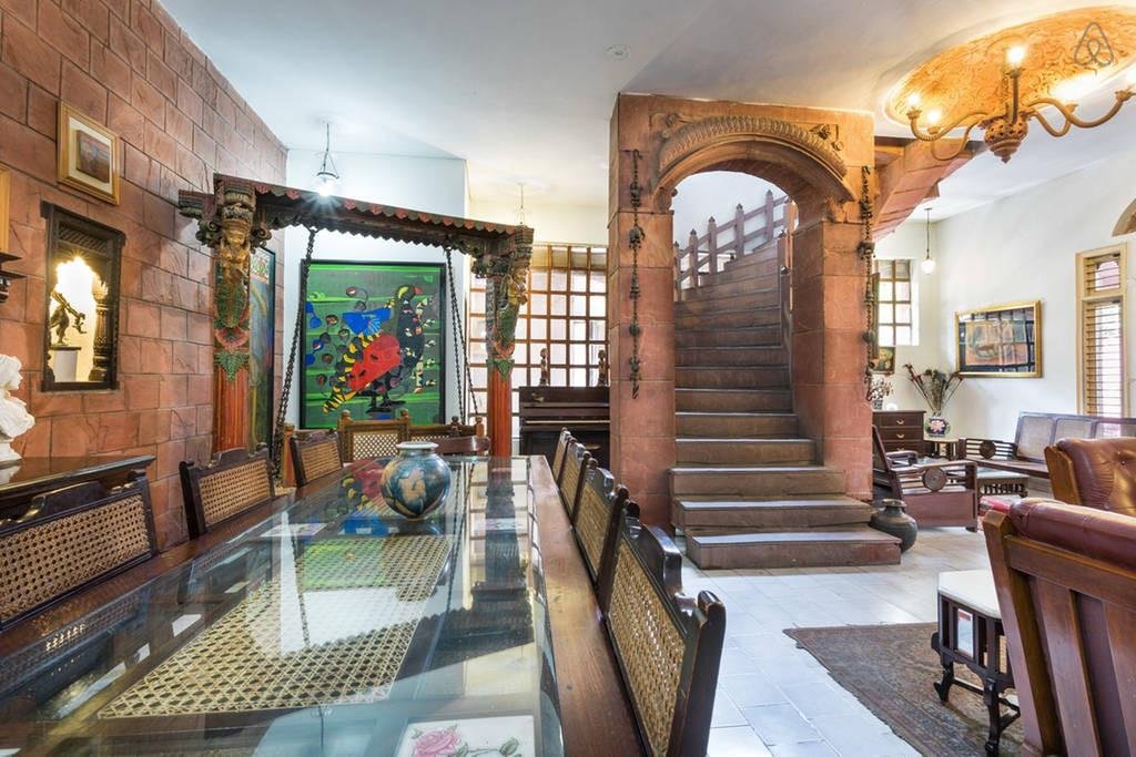 Living room with arch and antique furniture